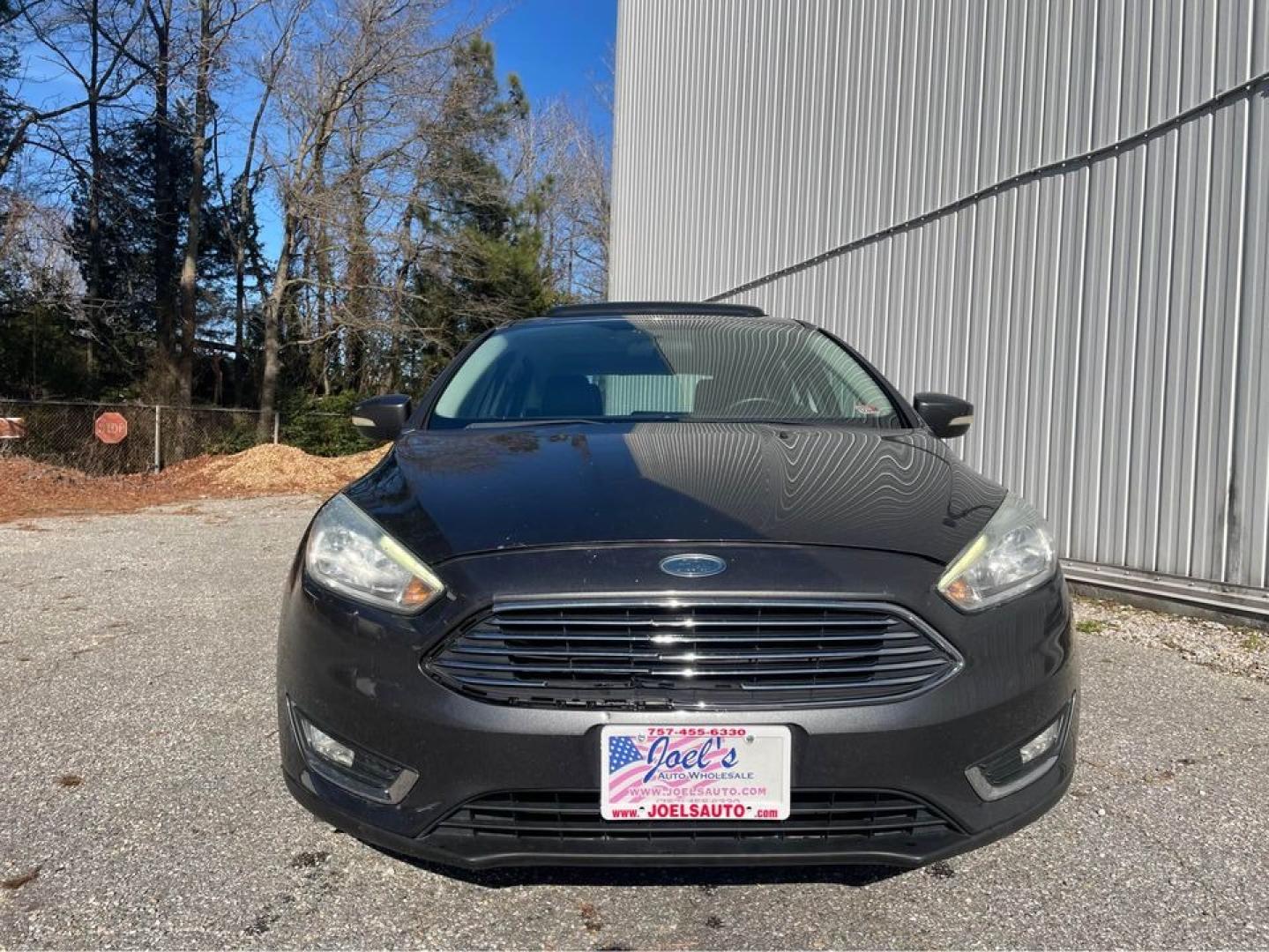 2015 Grey /Black Ford Focus Titanium (1FADP3N26FL) with an 2.0 4 CYL engine, Auto transmission, located at 5700 Curlew Drive, Norfolk, VA, 23502, (757) 455-6330, 36.841885, -76.209412 - Photo#5